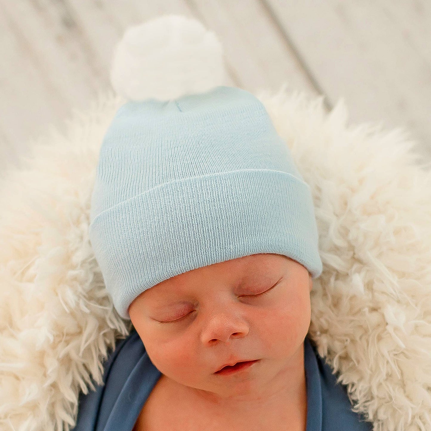 FUZZY White Pom Newborn BLUE Hospital Hat - Gender Neutral