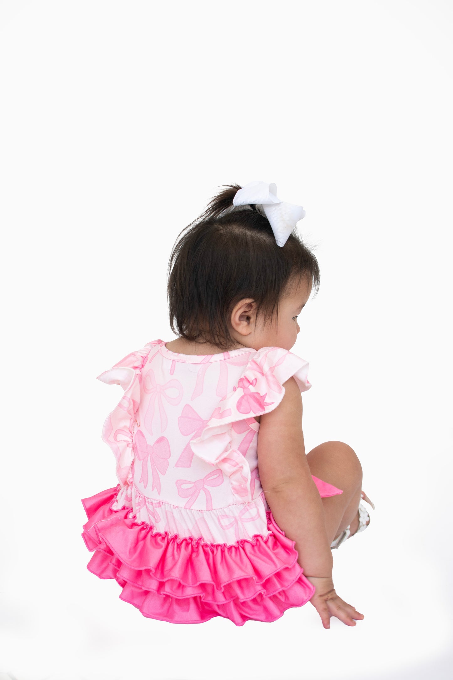 Pretty in Pink Bow Ruffle Romper
