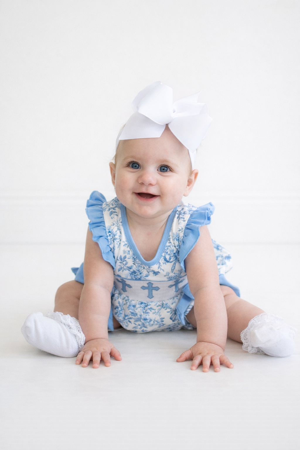 Blue floral cross smocked ruffle bubble
