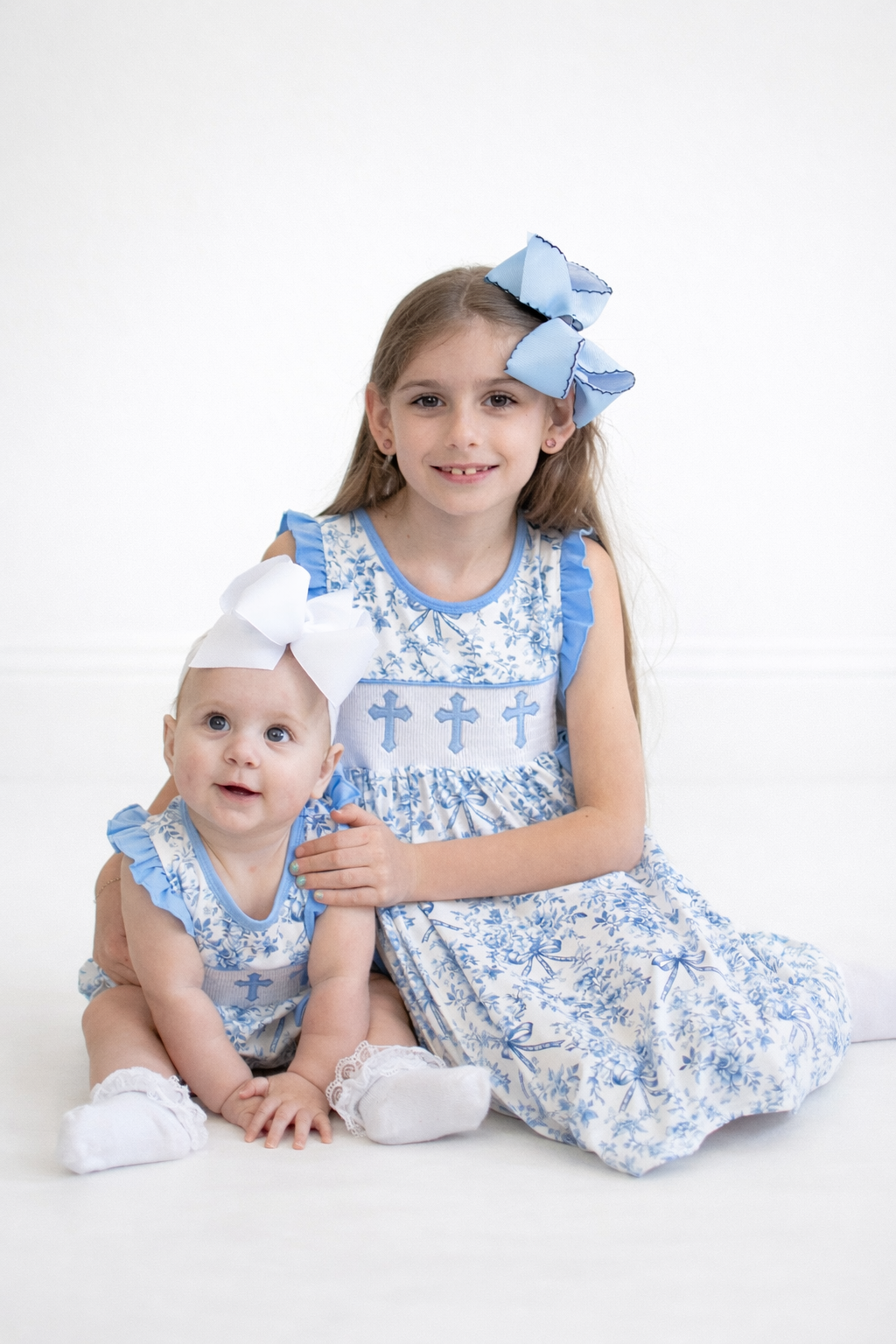 Blue floral cross smocked ruffle bubble