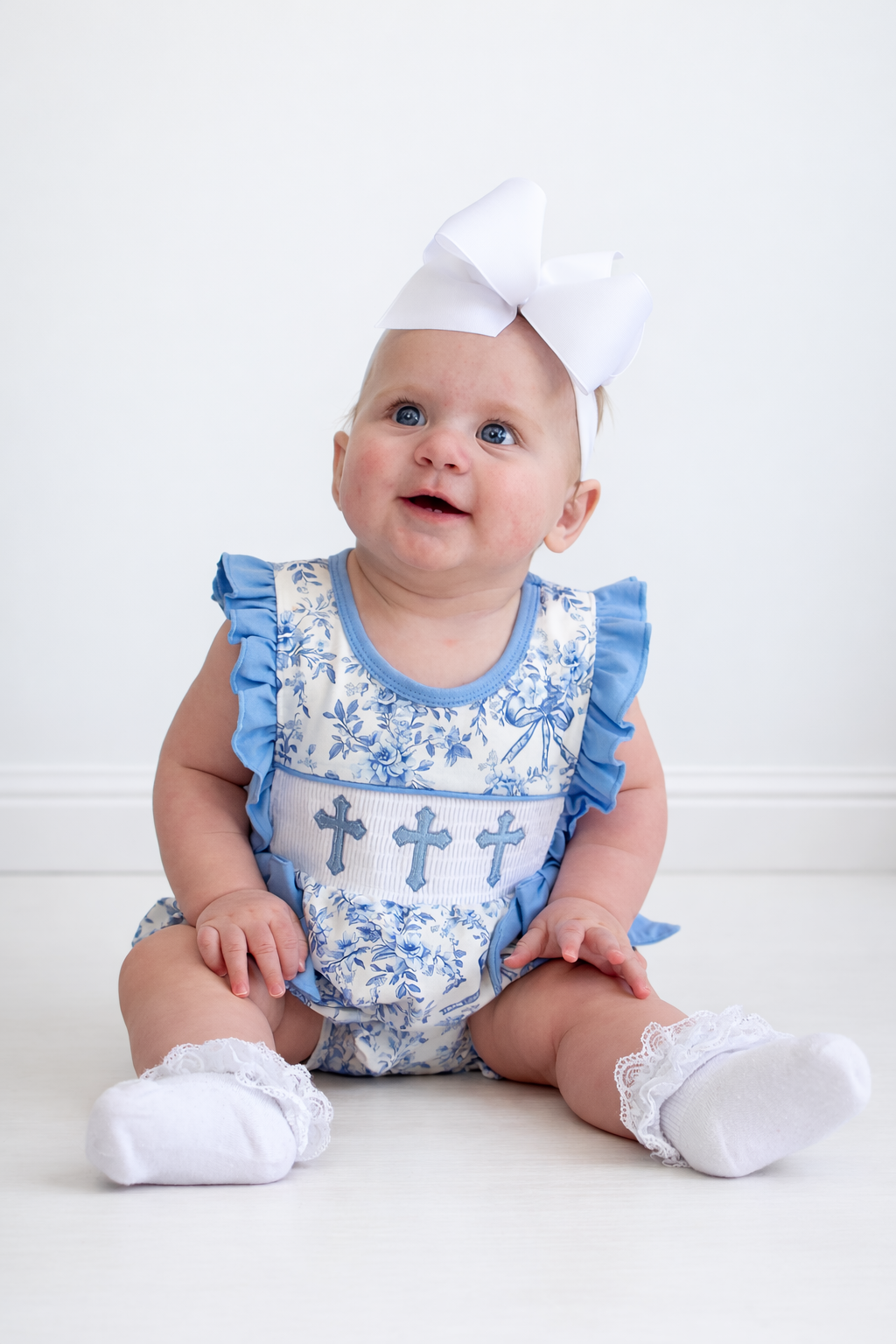 Blue floral cross smocked ruffle bubble