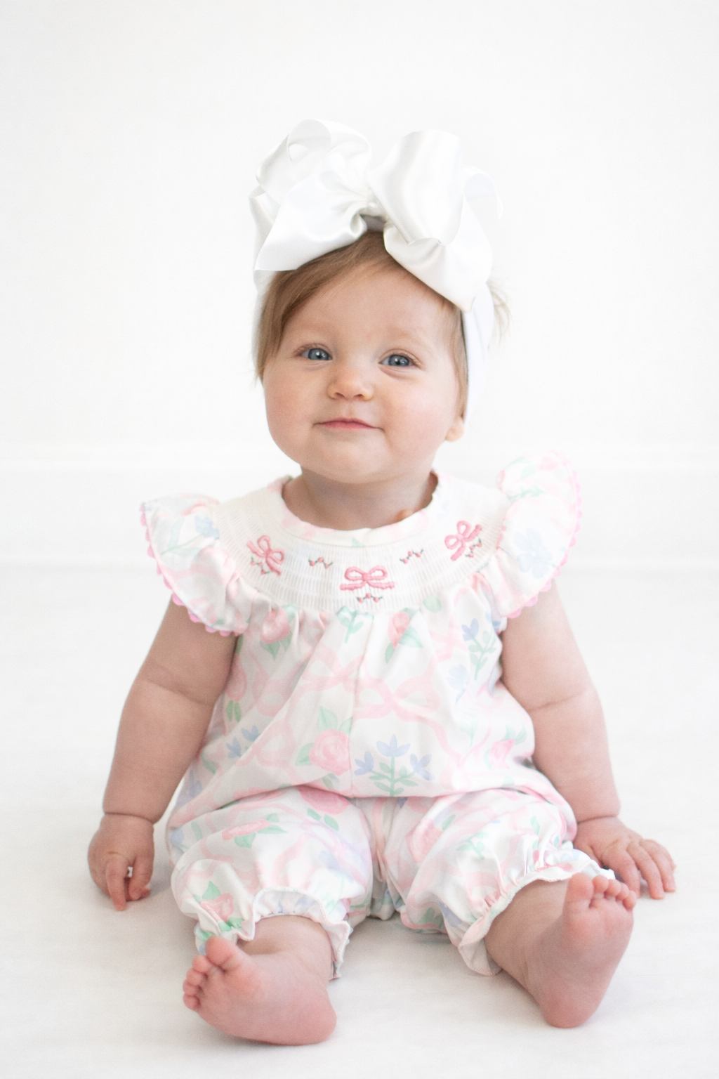 Trellis Bow Smocked Baby Romper