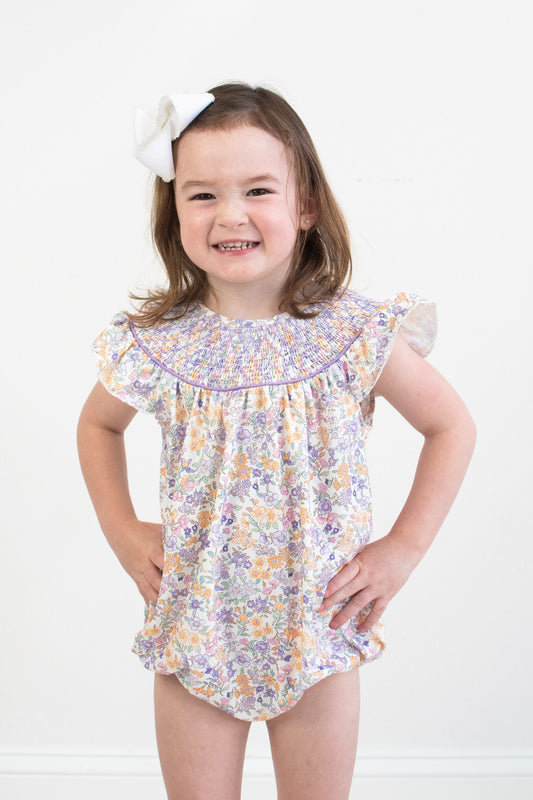 Purple floral smocked ruffle bubble